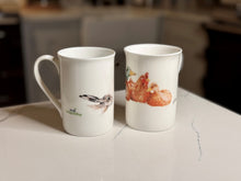 Load image into Gallery viewer, Mug - Hares by Gill Wilson
